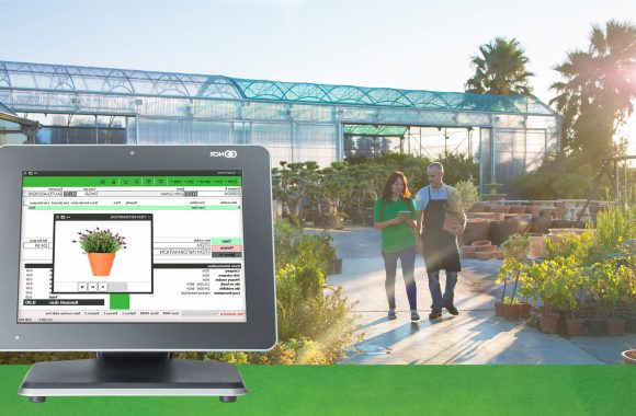 garden cpc 2 people walking with mobile pos